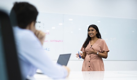 Man and woman discussing in a conference room