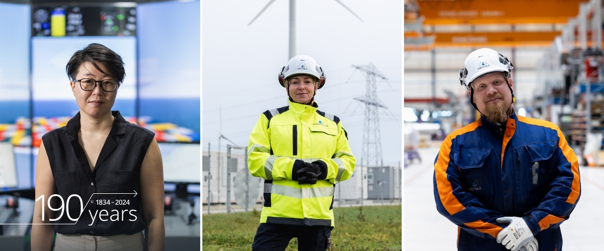 Three Wärtsilä employees looking proud and happy