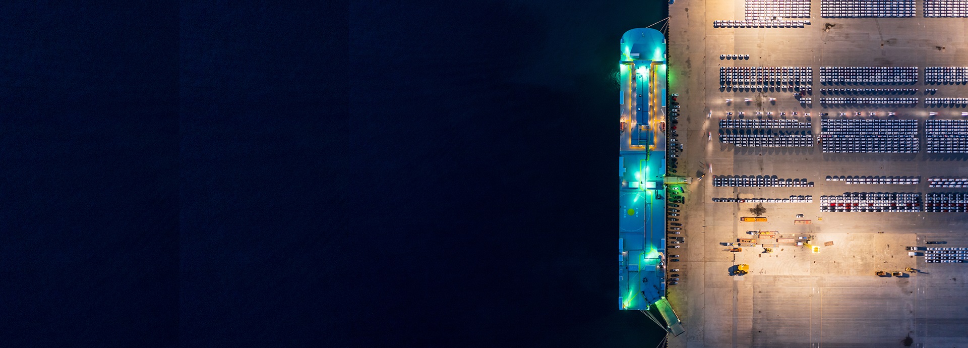 night-time image of a car carrier vessel