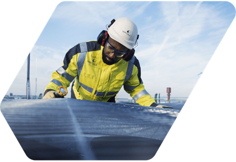 A man doing solar panel maintenance
