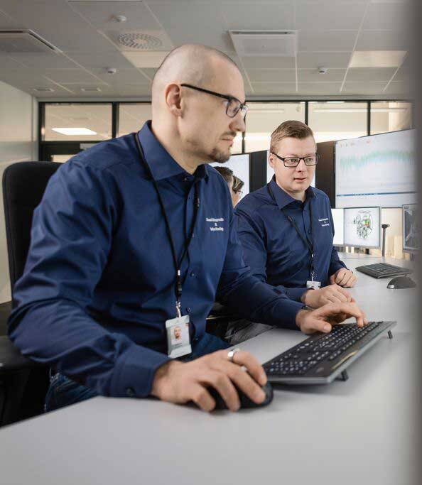 Man in front of computer screen