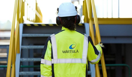 Engineer outside a power plant