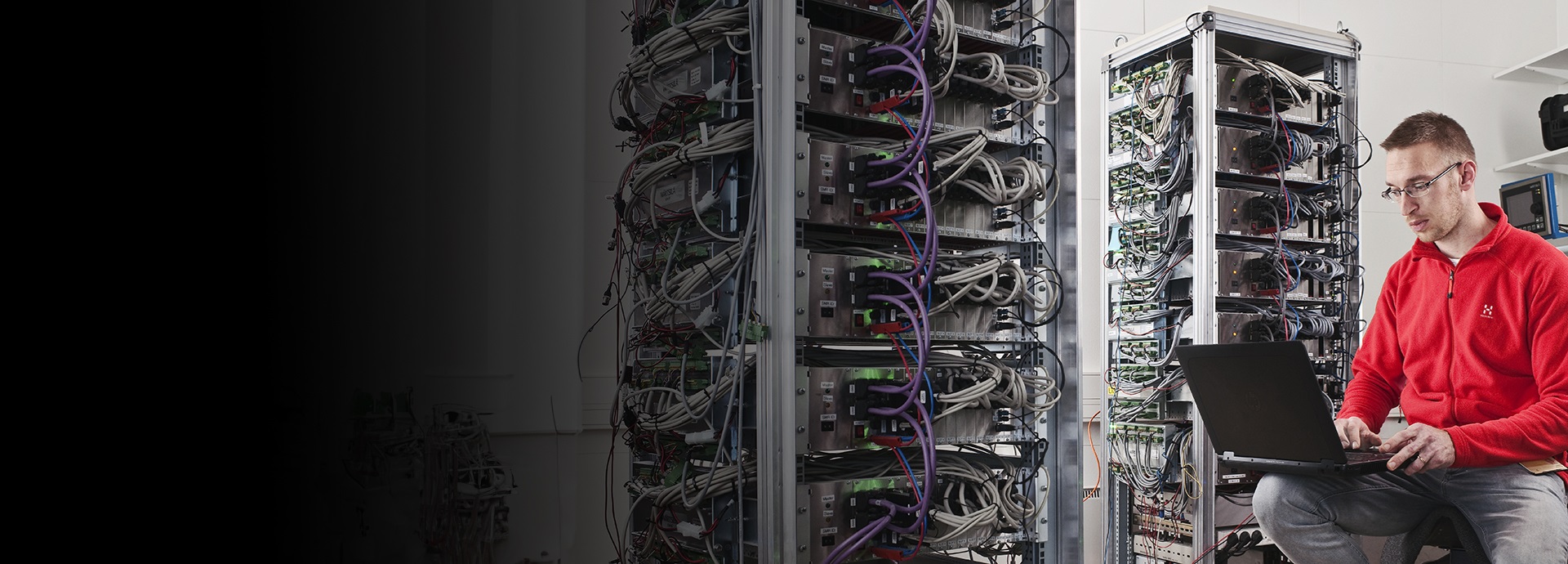 men working in a server room