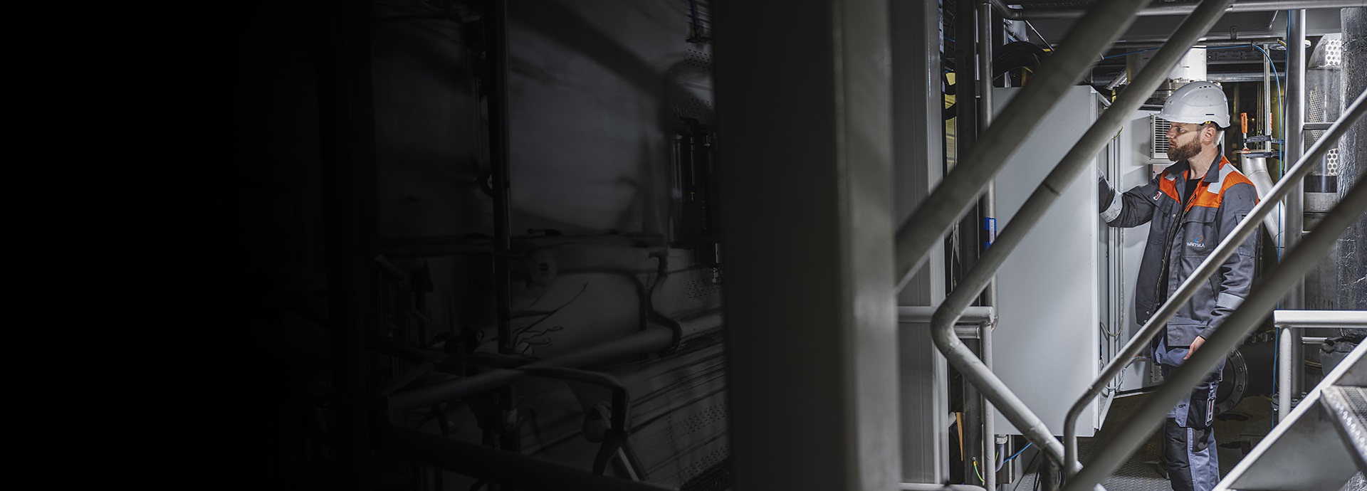 Wärtsilä Service employee on board checking equipment