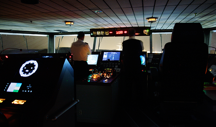 People on a bridge of a ship