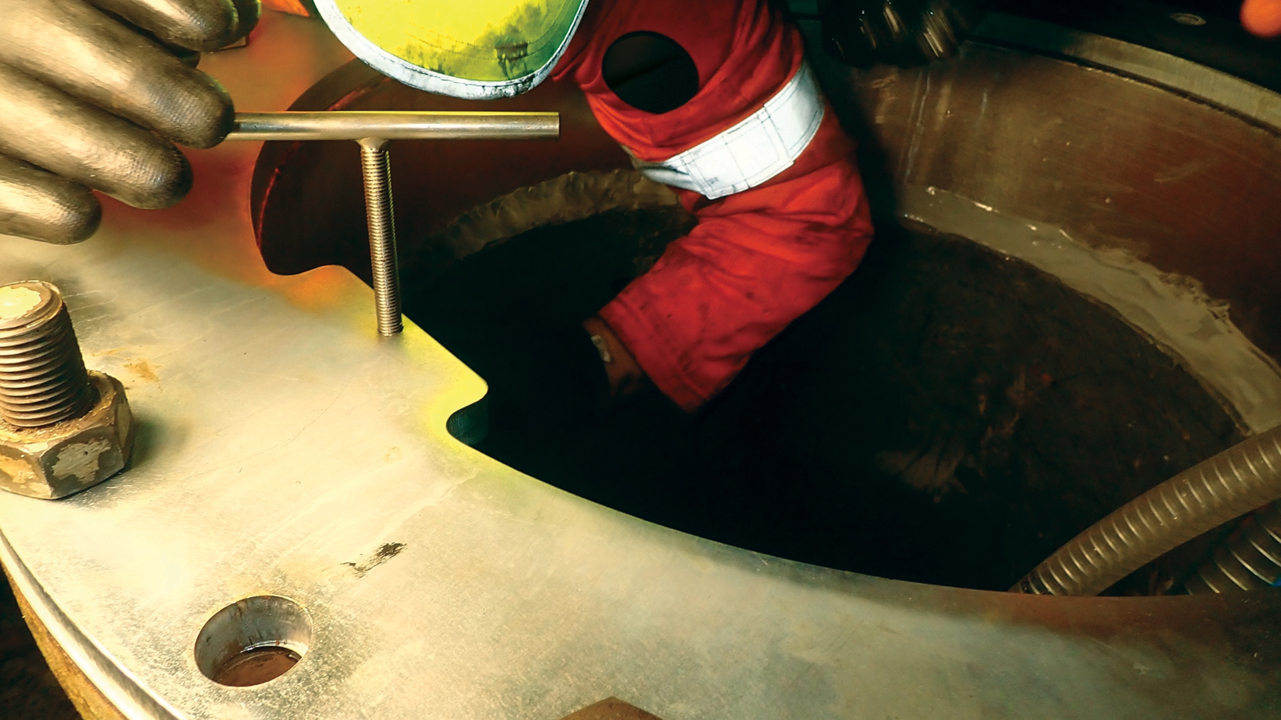 Diver engineer working on scrubber pipework
