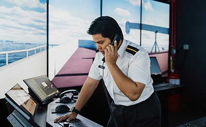 men using the Wärtsilä GMDSS Simulator