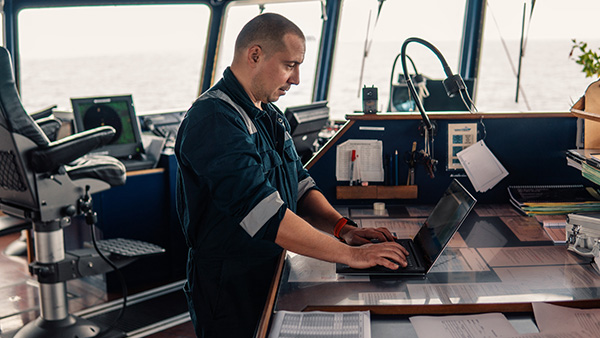 Man working in ship bridge
