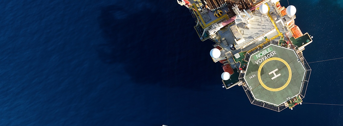 bird's eye view of the Noble Voyager V-rig drillship