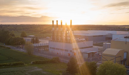 power plant at sunset